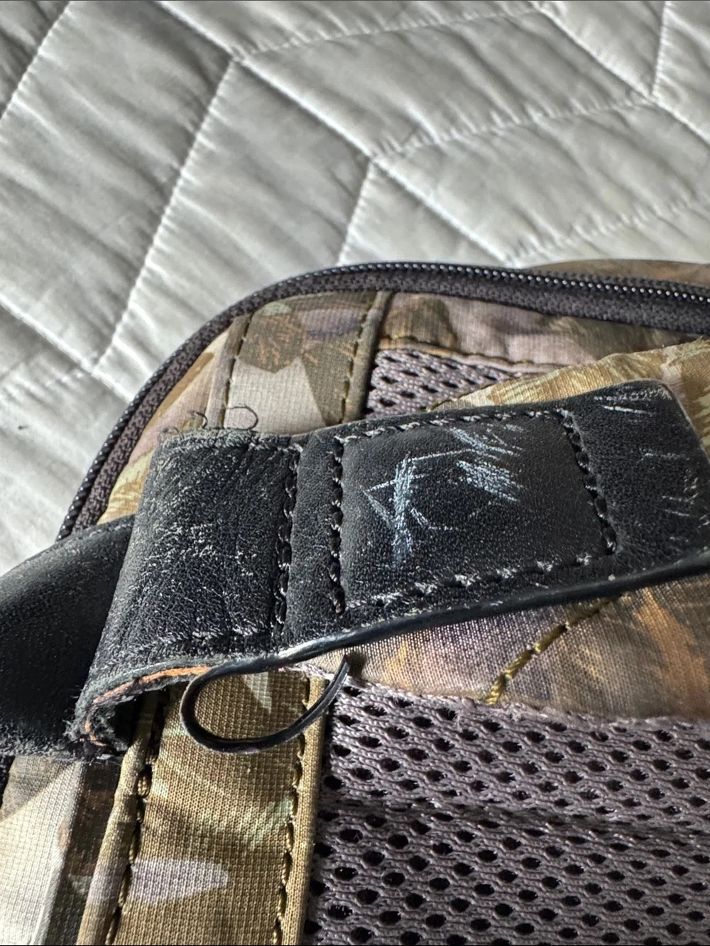 Tumi Black Leather and Brown Leaf-Print Backpack USED